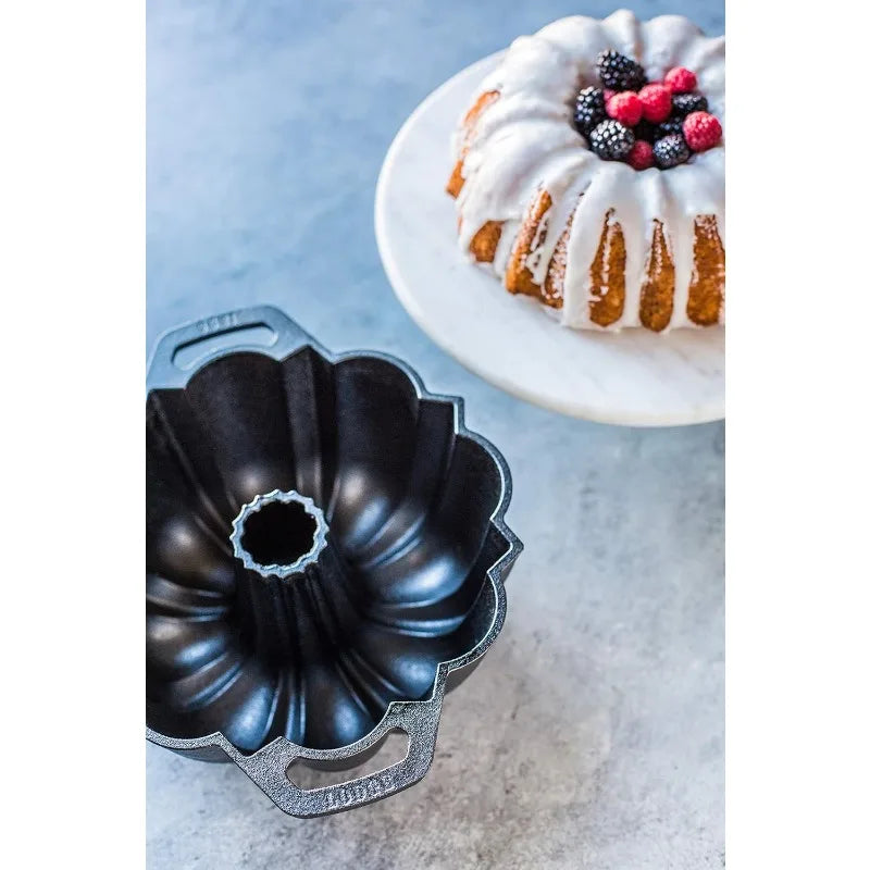 Lodge Legacy Series - Seasoned Cast Iron Fluted Cake Pan with Assist Handles.
