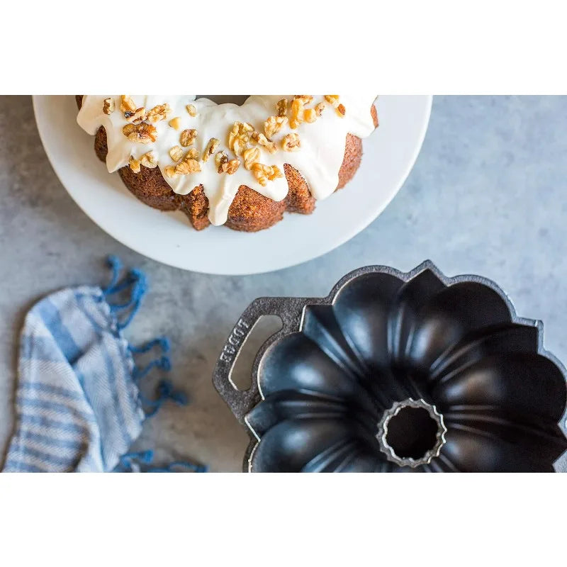 Lodge Legacy Series - Seasoned Cast Iron Fluted Cake Pan with Assist Handles.